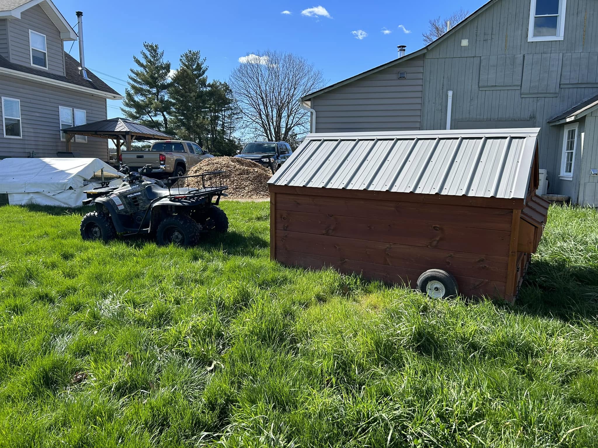 ATV beside the chicken coop